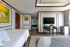 Et tv og/eller underholdning på Cherry Đà Lạt 3 - Luxury Hotel