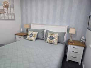 En eller flere senge i et værelse på A La Roslyn