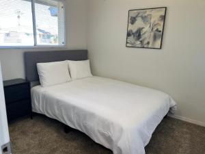 En eller flere senge i et værelse på Home in Tempe