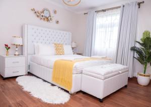 Giường trong phòng chung tại Hazel's Condo-Deluxe Master +47 ảnh