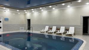 Bazén v ubytování Ohu Palace Hotel nebo v jeho okolí