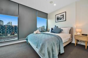 En eller flere senge i et værelse på Vista Blue on Spencer + 18 billeder