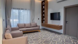 Un televizor și/sau centru de divertisment la oasis of shade