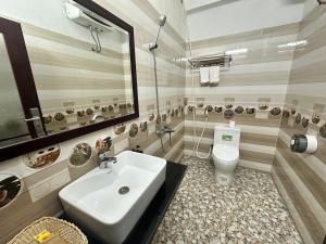 Koupelna v ubytování DH Sapa Hotel & Travel + 30 fotografií