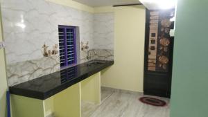 Kuchyň nebo kuchyňský kout v ubytování Homestay