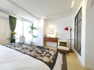 Postel nebo postele na pokoji v ubytování Shanghai Hills & Panorama River Suite Close to Metro Line 4