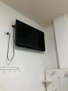 Et tv og/eller underholdning på Hostal Bellettini + 14 billeder