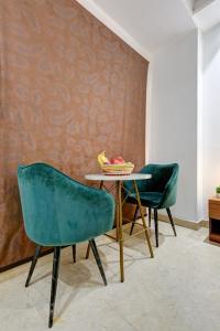 Posezení v ubytování Qotel Comfort Ashok Vihar - Near Delhi University