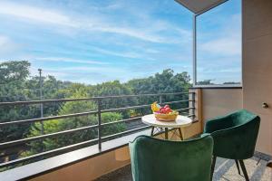 Balkón nebo terasa v ubytování Qotel Comfort Ashok Vihar - Near Delhi University