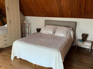 En eller flere senge i et værelse på Le Relax 41 + 4 billeder