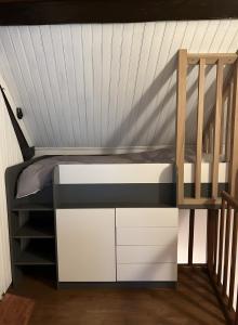 En eller flere senge i et værelse på Le Relax 41