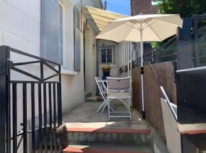 En balkon eller terrasse på Le Relax 41