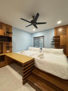 En eller flere senge i et værelse på Ichinichi Home