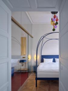 En eller flere senge i et værelse på donebe boutique hotel & wellness