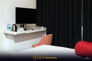 TV a/nebo společenská místnost v ubytování Hotel Senondra Ampara