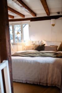 Un pat sau paturi într-o cameră la HofZeit2