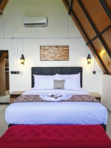 Ένα ή περισσότερα κρεβάτια σε δωμάτιο στο Senaru Paradise