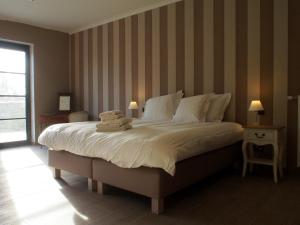 Postel nebo postele na pokoji v ubytování Hotel Vorsen