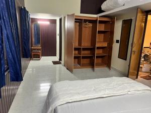 Postel nebo postele na pokoji v ubytování Sidhi Vinayaka Homestay