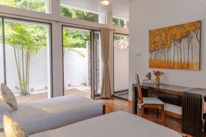 Postel nebo postele na pokoji v ubytování Villa 4 - Luxury Private Pool Villa + 50 fotografií