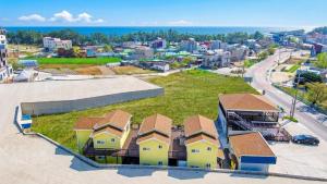 an aerial view of a city with houses at Samcheok Good Friend Pension in Samcheok +2 photos