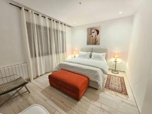 Ένα ή περισσότερα κρεβάτια σε δωμάτιο στο Refined villa in the heart of La Marsa with garden