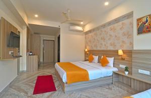 Voodi või voodid majutusasutuse TrimHotel Grandview Jaipur toas