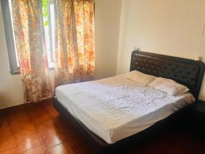 Ένα ή περισσότερα κρεβάτια σε δωμάτιο στο Riverok Resorts