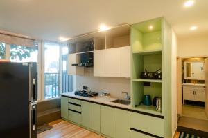 Køkken eller tekøkken på Nivaas Homestay + 34 billeder