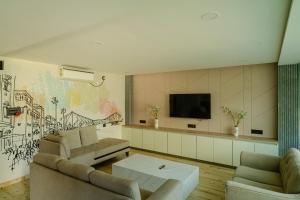 Et tv og/eller underholdning på Nivaas Homestay