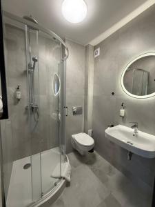 Koupelna v ubytování Hotel Martex + 26 fotografií