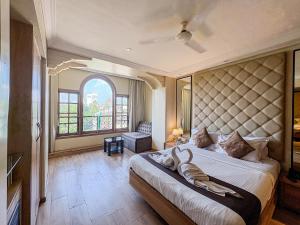 En eller flere senge i et værelse på Gulf Hotel Mumbai- The Boutique Hotel Colaba Mumbai