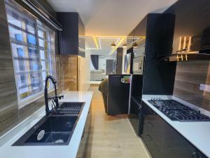 Køkken eller tekøkken på Citynest Apartment Laderin