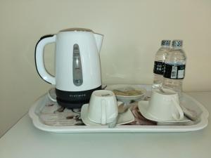 Kaffe- og tefaciliteter på Golden Favour Homes