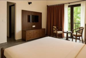 Et tv og/eller underholdning på Sonemale Resort Chikmagalur