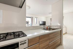 Køkken eller tekøkken på Ganadan福岡南