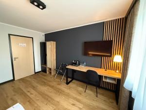 Kuchyň nebo kuchyňský kout v ubytování Hotel Martex