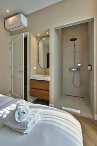 Koupelna v ubytování Jorisz Apartments + 48 fotografií