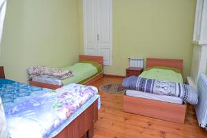 Postel nebo postele na pokoji v ubytování Ilham Mustafa Houses