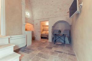 TV a/nebo společenská místnost v ubytování Resort La Corte Dell'Astore - Wild in Style Resort