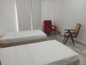 En eller flere senge i et værelse på Shri radha kripalu dham