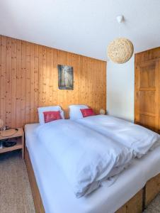 Postel nebo postele na pokoji v ubytování Appartement-chalet à Verbier près des pistes