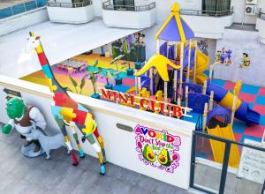a childrens play area with toys and a playground at Eflina Resort Hotel&Spa in Alanya +12 photos