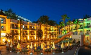 a resort with a slide and a water park at Eflina Resort Hotel&Spa in Alanya