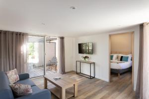 Et tv og/eller underholdning på Golfe Hôtel & Spa Porto-Vecchio