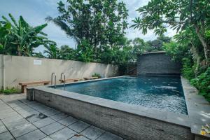 Bazén v ubytování Kata House nebo v jeho okolí