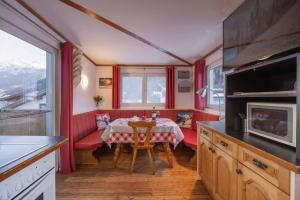 Kuchyň nebo kuchyňský kout v ubytování Apart Toscana