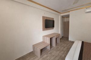 Et tv og/eller underholdning på Riverline Gold Resort