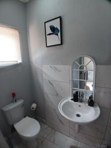 Phòng tắm tại Red Hills Guesthouse