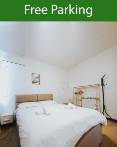 Postel nebo postele na pokoji v ubytování Villa Reve de Tirana